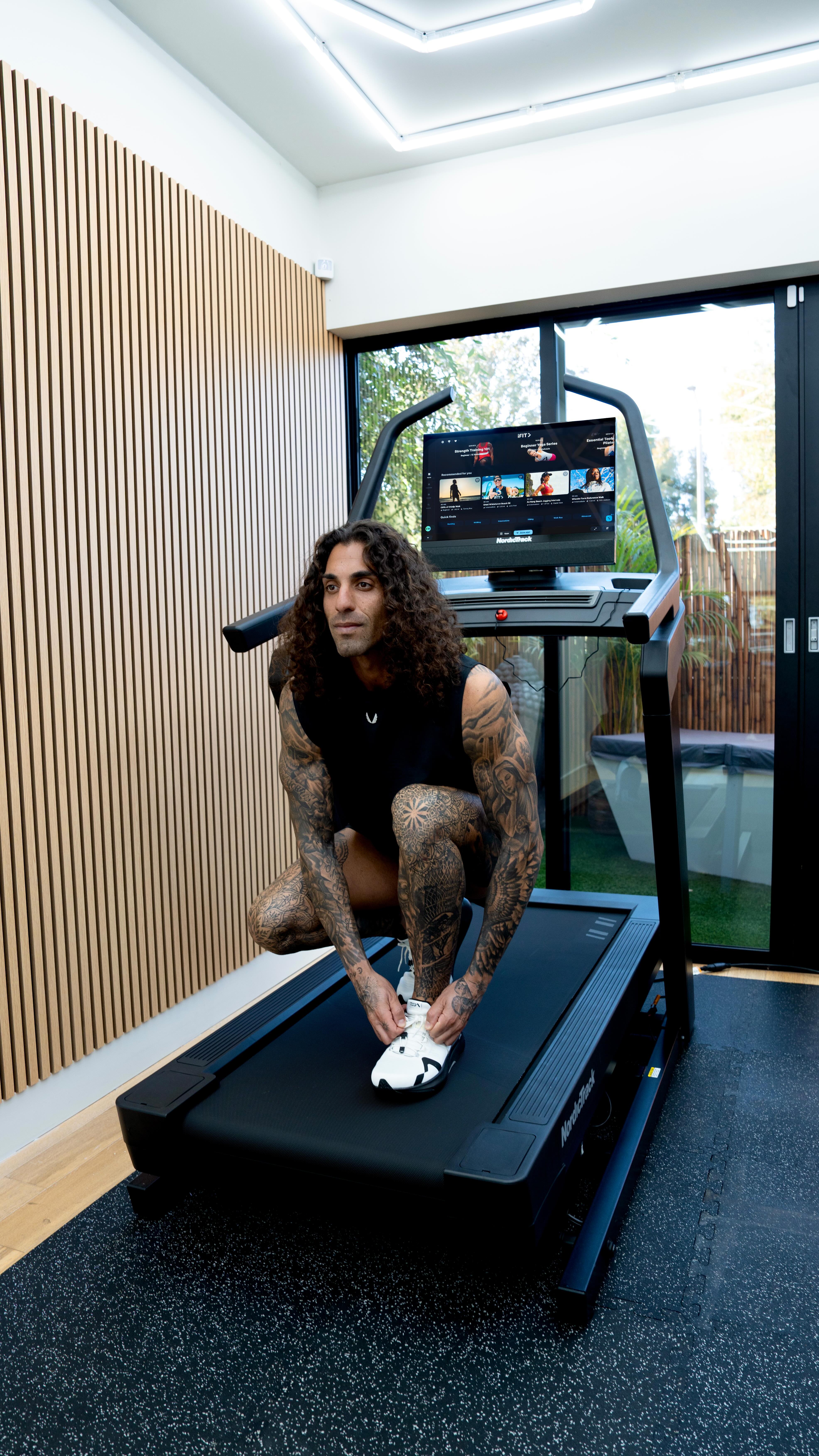 Instagram post by @eliwehbe for NordicTrack. Caption reads: Let me show you my top-rated treadmill I’ve....