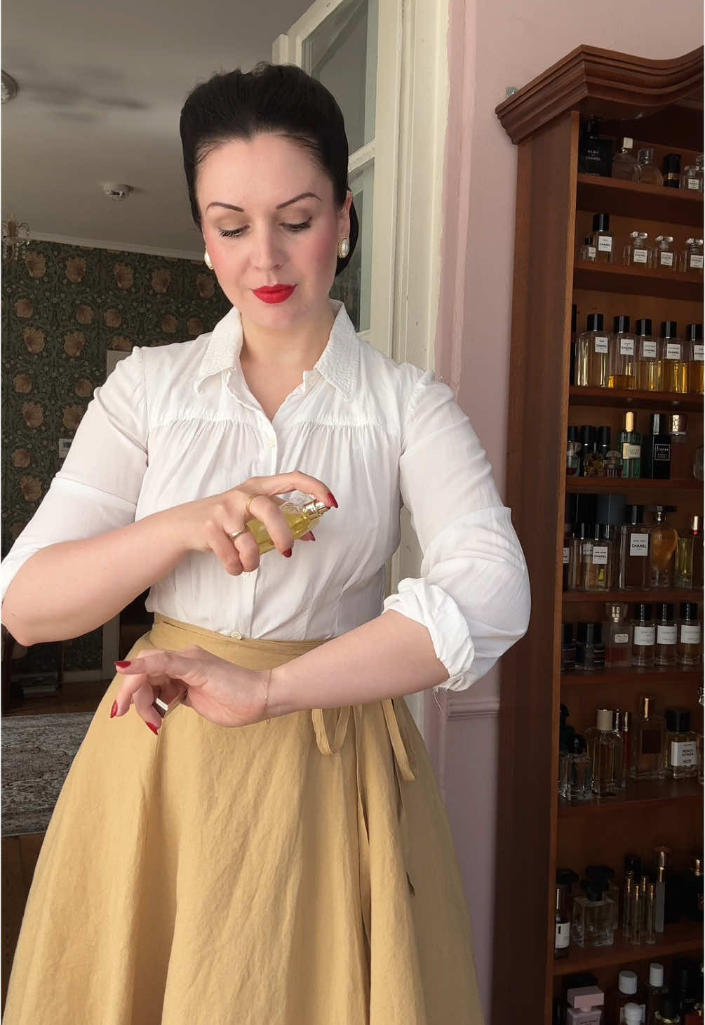 TikTok post by @madame.rhos for Parfums Lubner. Caption reads: Dancing with the sun 🌞 ___ Werbung • A sunny GRWM....