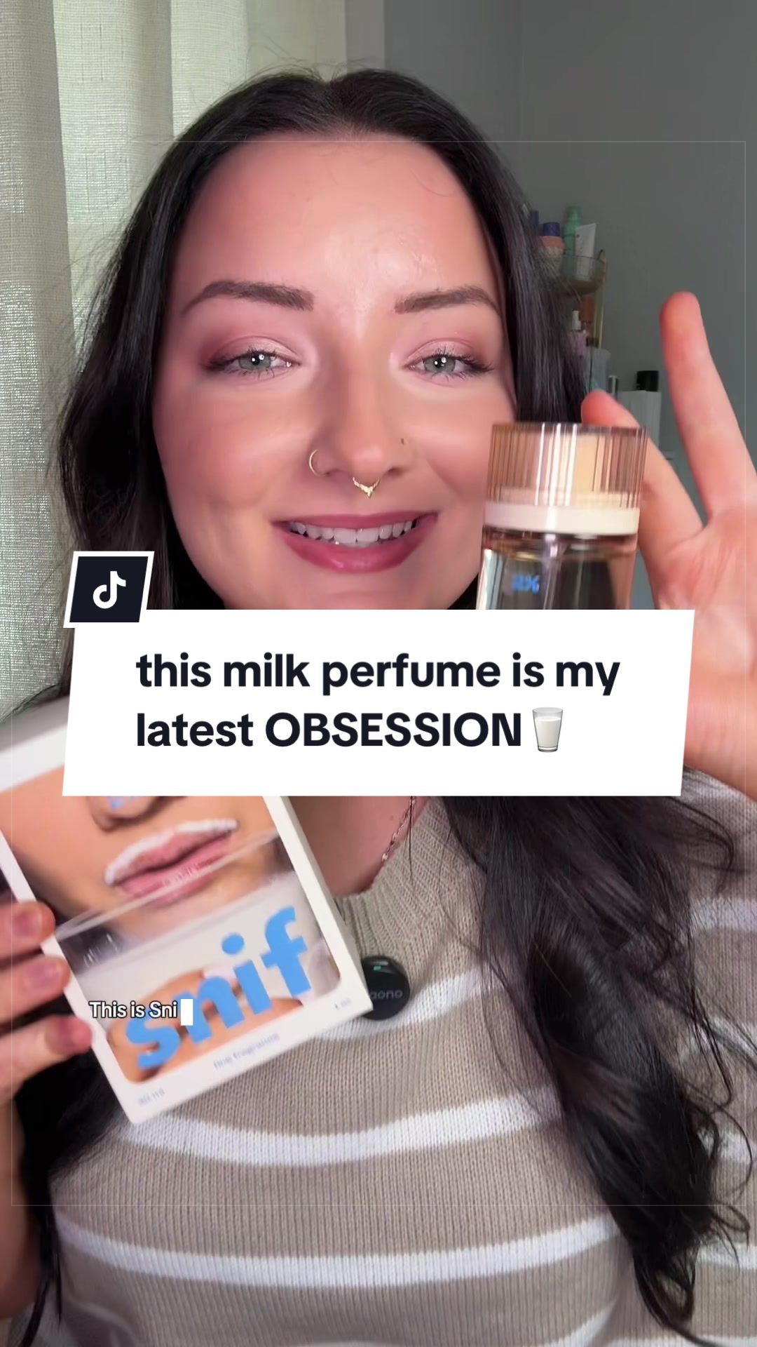 TikTok post by @thelaineyblair for Snif. Caption reads: [...] perfume has been my latest OBSESSION🥛 #snif....