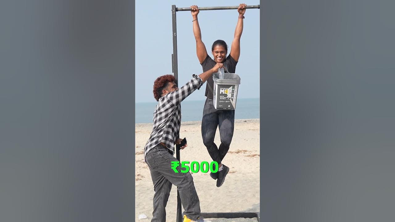 YouTube post by @ArjunMPShorts for MuscleBlaze. Caption reads: Hang and get 10,000 Rupees.