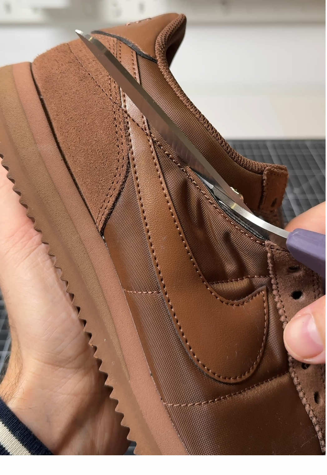 TikTok post by @maxplore for Zalando. Caption reads: [...] Nike sneaker customization 🤎✨ Werbung....