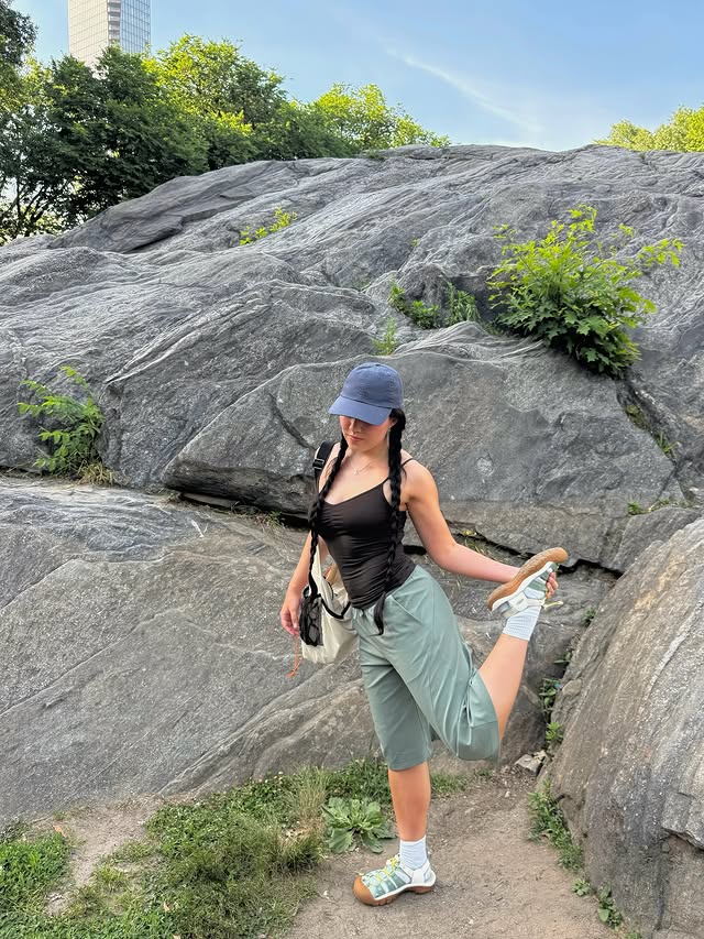 Instagram post by @_amberalexander for KEEN. Caption reads: nature ROCKS! 🪨🌱⊹ ࣪ ˖ wearing my @keen Newport....