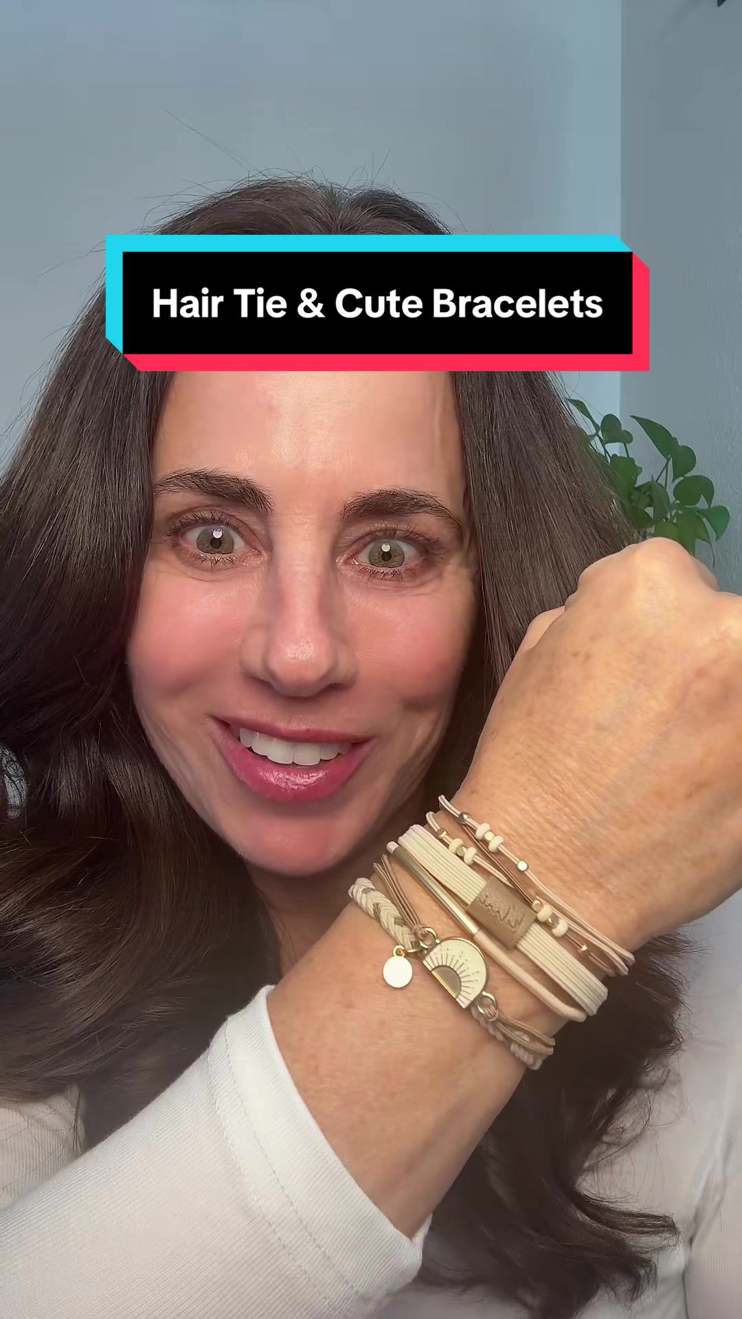 TikTok post by @gmarie223 for K’Lani. Caption reads: Say goodbye to ugly black hair ties and hello to....