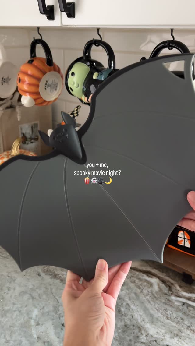 Instagram post by @momminwithmeg for OTOTO Design. Caption reads: [...] for a spooky movie night! #sponsored....