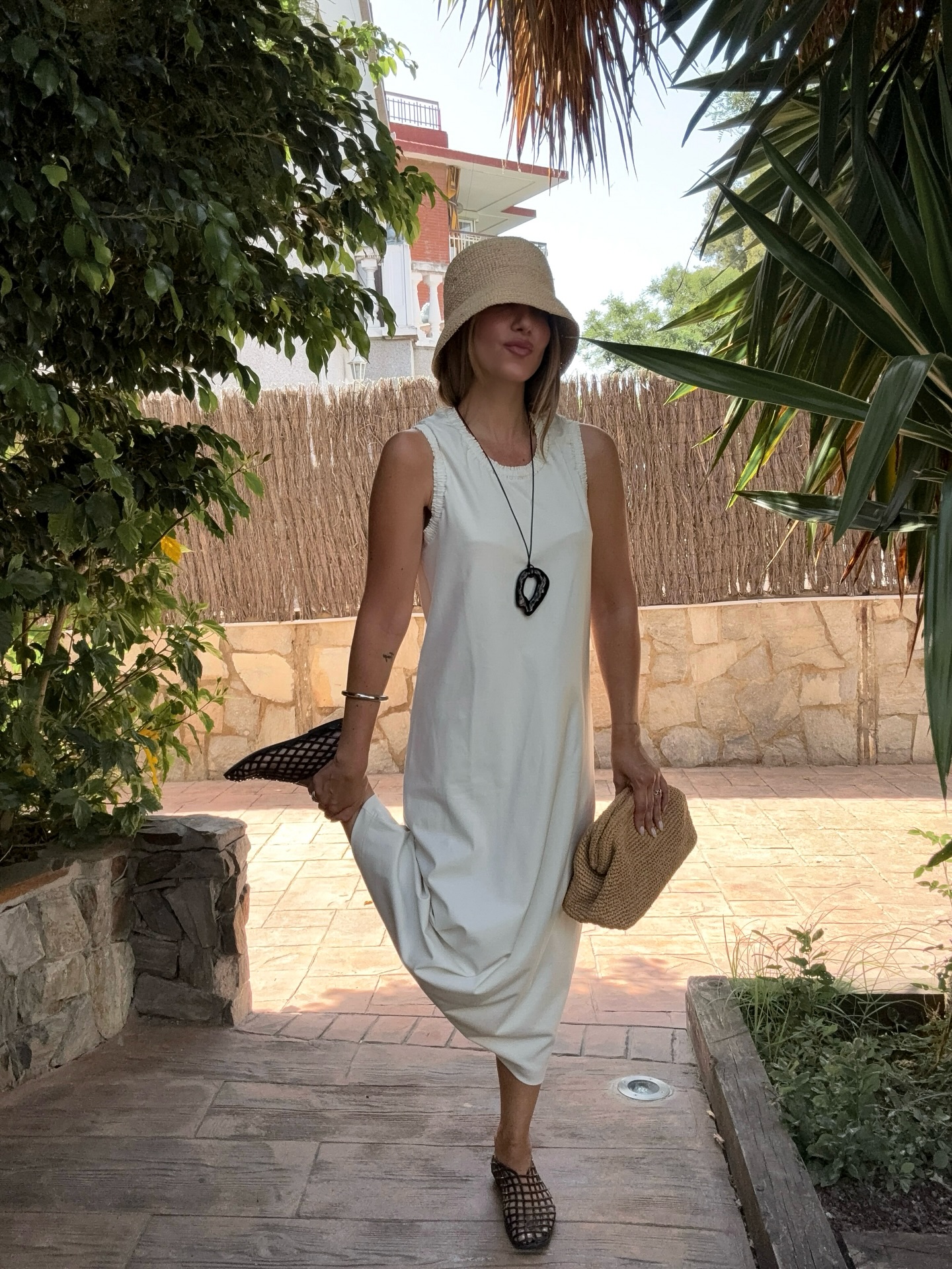 Instagram post by @le.petit.colette for Fashion Inspiration. Caption reads: Holiday Edit: elevate your minimal summer style....