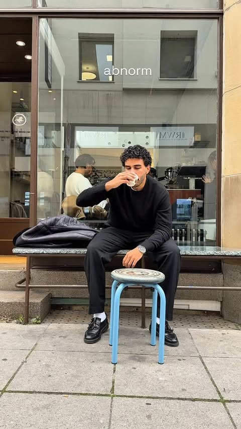 Instagram post by @_itsmosaad for UNIQLO. Caption reads: All black. No noise. Just @uniqlo energy. 🖤....