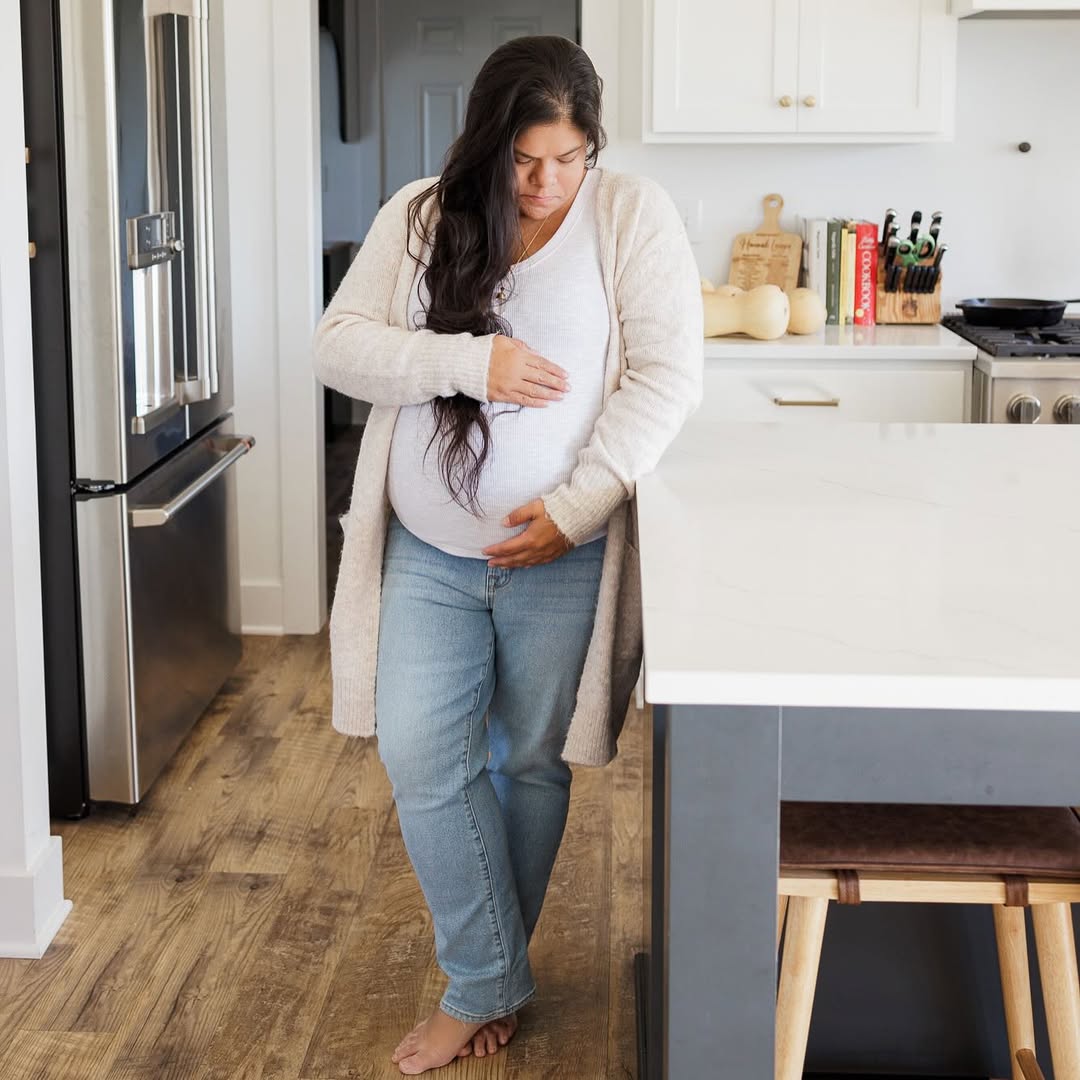 Instagram post by @wearlovewanders for shoppinkblush.com. Caption reads: Barefoot and pregnant in the kitchen 💕

I feel....