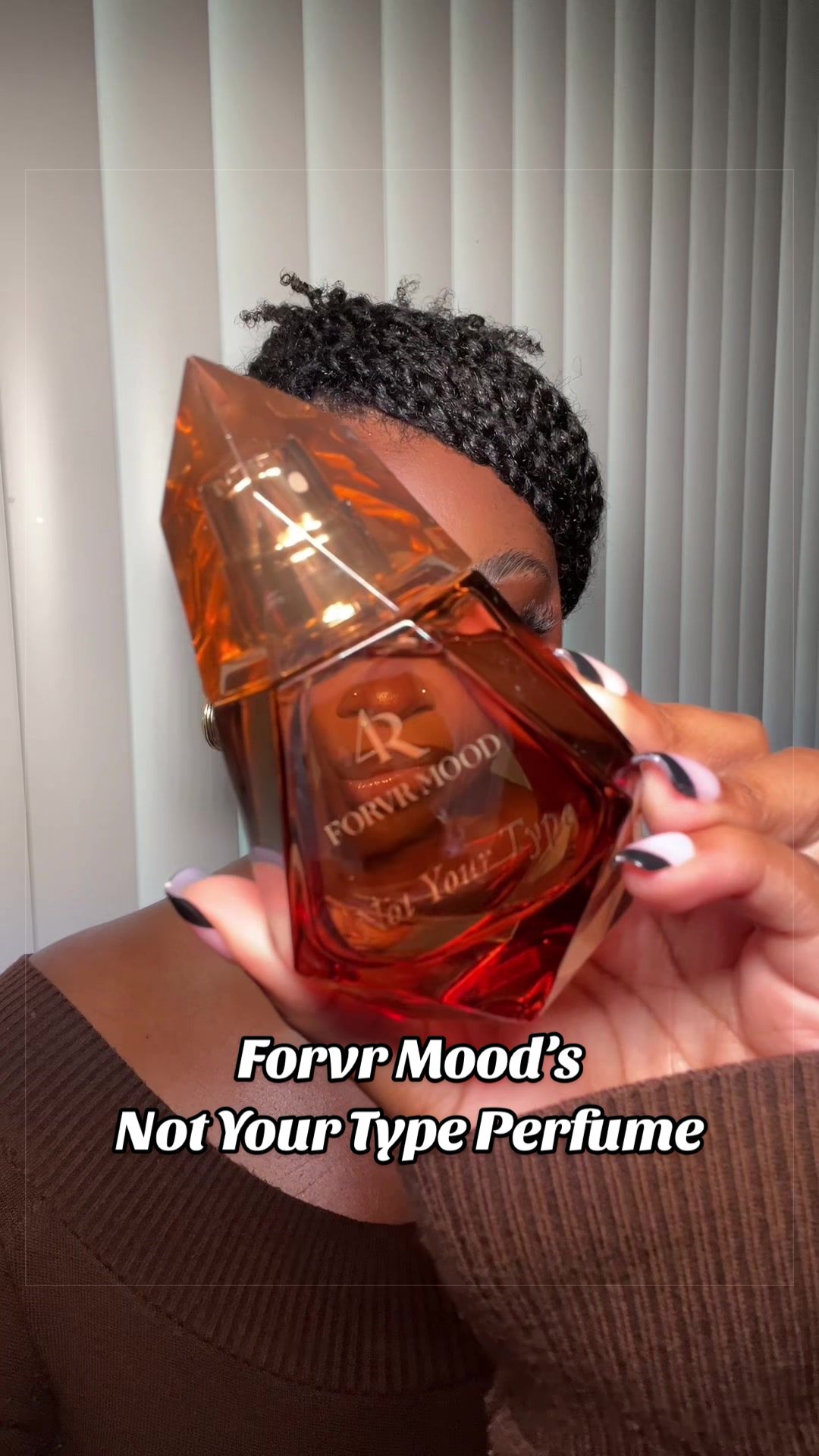 TikTok post by @ashleecookk for FORVR MOOD. Caption reads: The new @FORVR MOOD Not Your Type perfume is bold,....