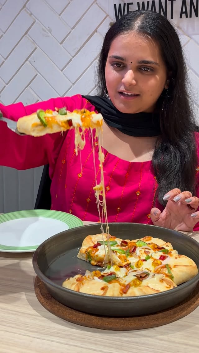 Instagram post by @bloggerwithagavel for Pizza Hut. Caption reads: @pizzahut_india Flip it, flip it, don’t you wanna....