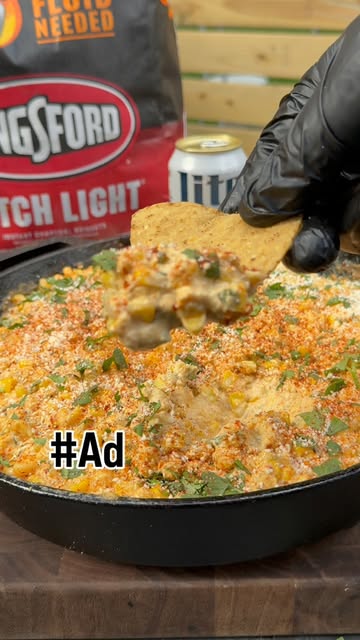 Instagram post by @cookingwithmrcooper for Miller Lite. Caption reads: #AD This Smoked Elote Dip won’t last long at the....
