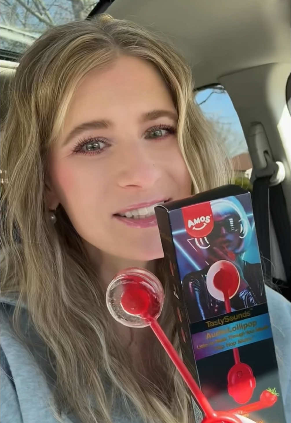 TikTok post by @iamsarahtonin for Amos Sweets. Caption reads: [...] Fun for kids & adults! @Amos Sweets....