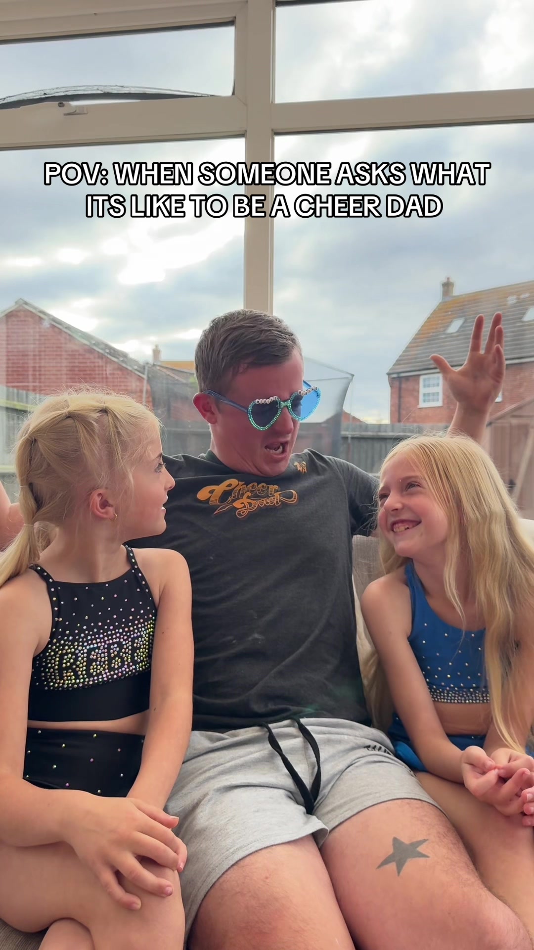 TikTok post by @zarabyrdandfam for Rebel Athletic. Caption reads: POV: CHEER DADS BE LIKE 😅💰👋 @Rebel Athletic UK....