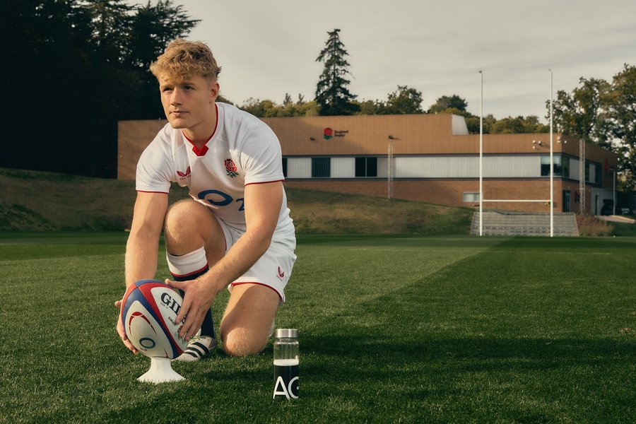 Instagram post by @finsmithh for AG1. Caption reads: Fully focused on Saturday w/ @drinkag1 #ad.