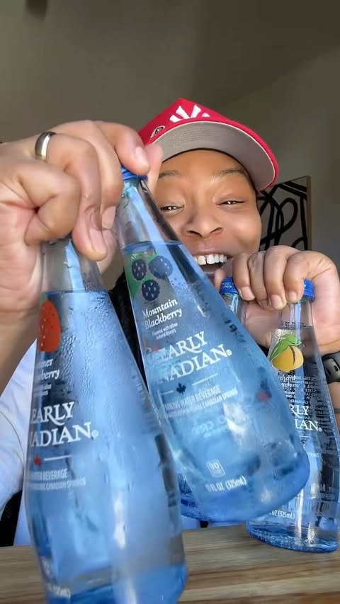 Instagram post by @munchwithdes for Clearly Canadian. Caption reads: Clearly Canadian sparkling waters still hits! 🤌🏽....