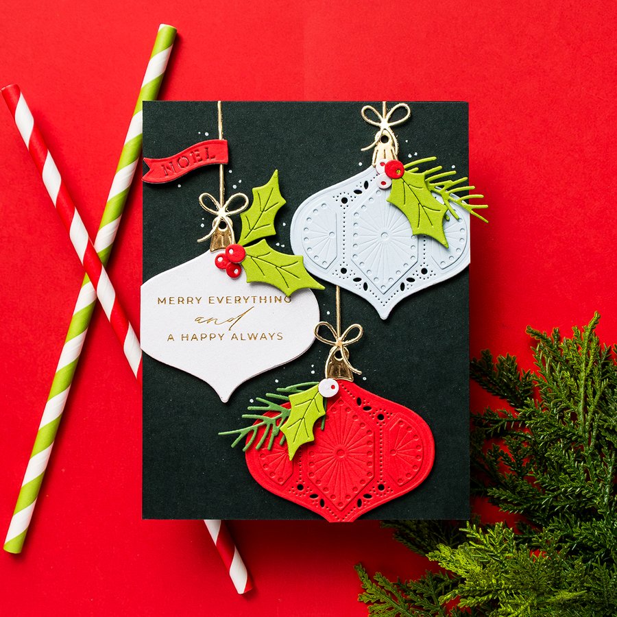 Instagram post by @yana.smakula for Spellbinders Paper Arts. Caption reads: Let’s open the 12 Days of Stitchmas Advent....