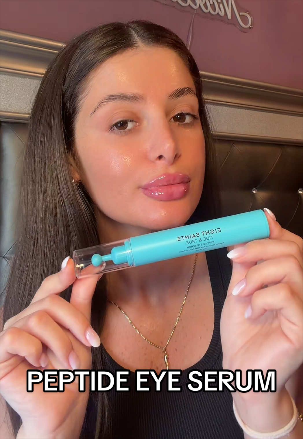 TikTok post by @nicolettagambino for Eight Saints Skincare. Caption reads: #peptideeyeserum #skincare @Eight Saints Skincare.