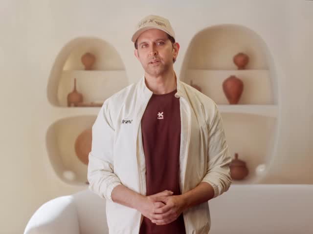 Instagram post by @hrxbrand for Country Delight. Caption reads: Your daily protein intake requirements are now....