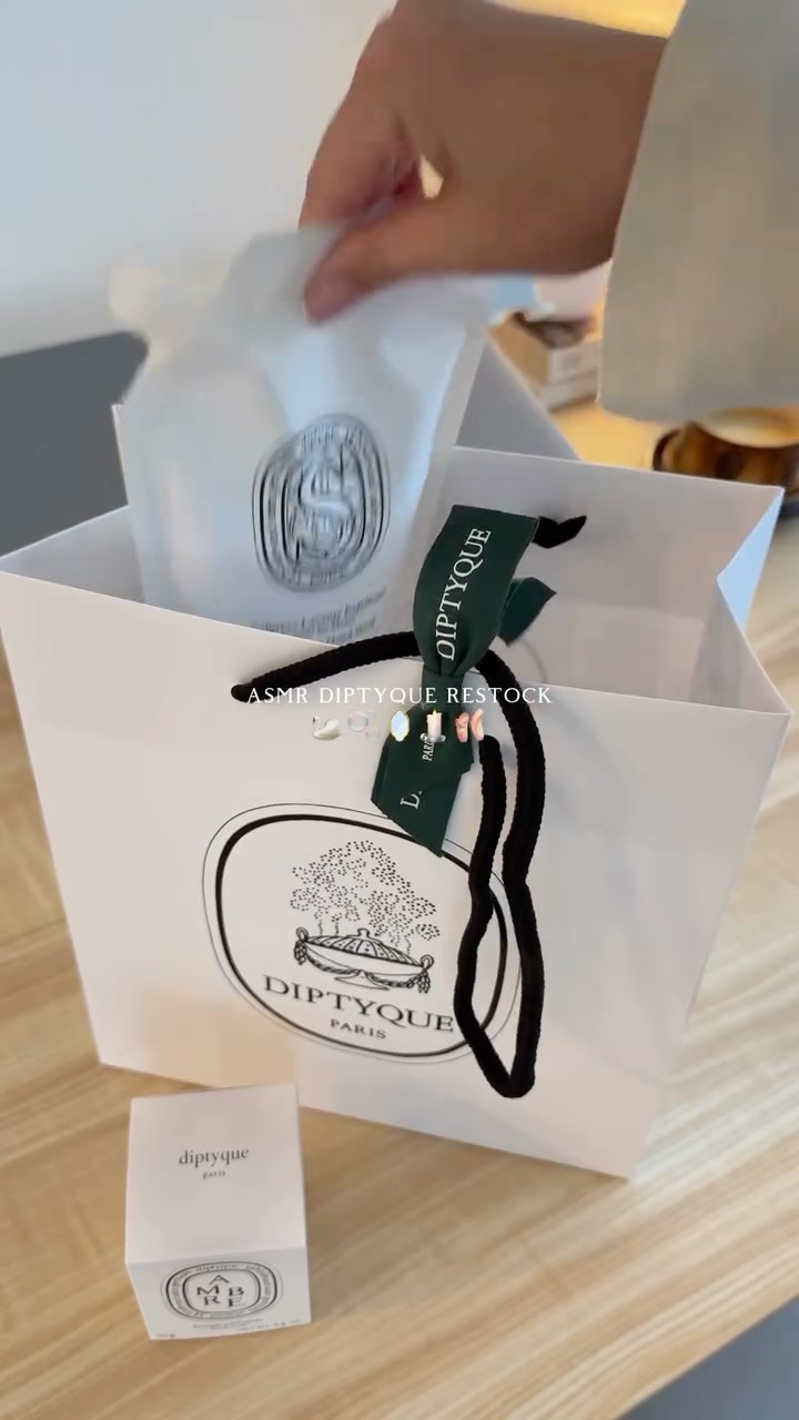 Instagram post by @jasylifestyle for Diptyque. Caption reads: Let’s unbox and restock some of my @diptyque....