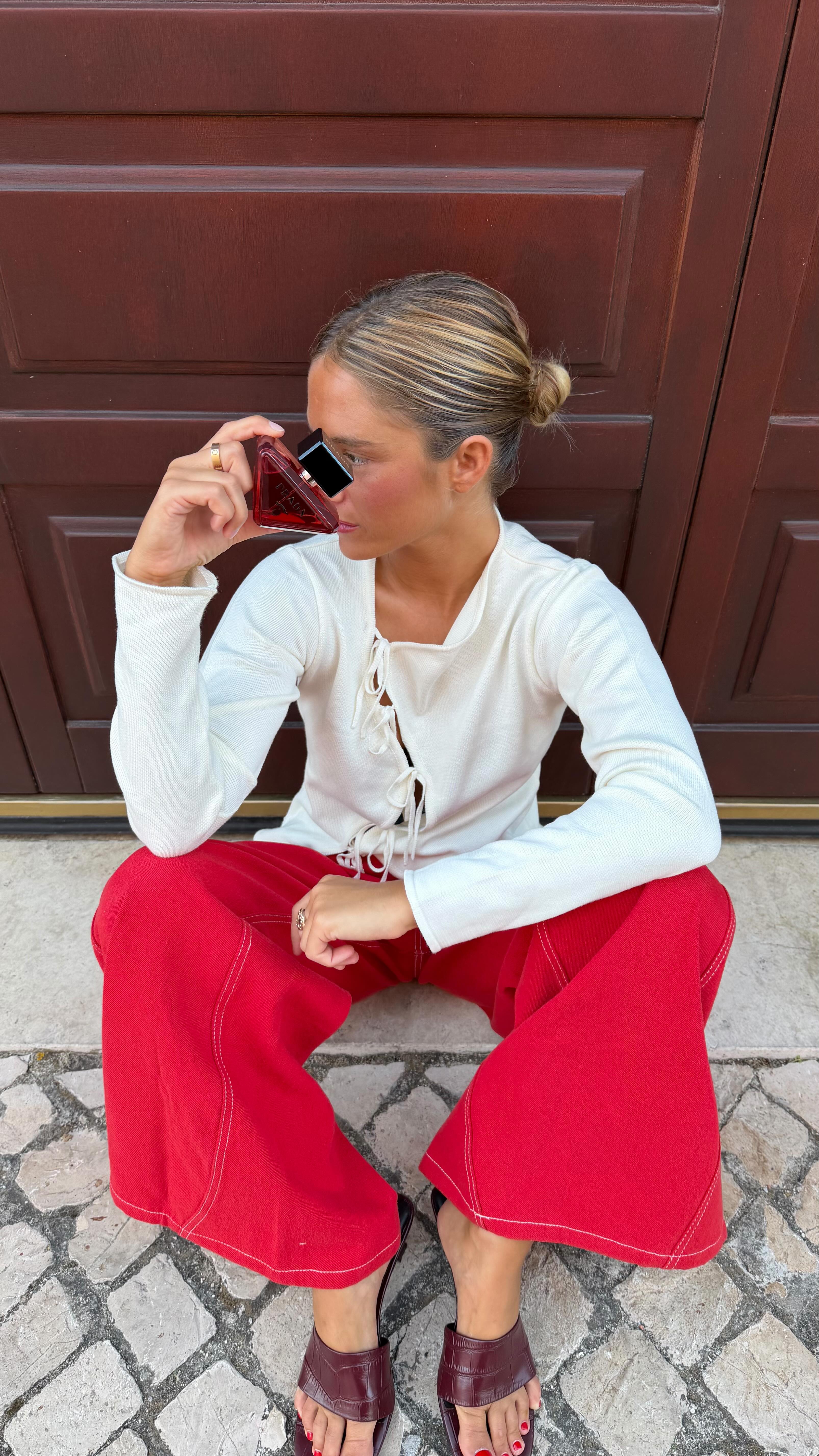 Instagram post by @caetanaba for Prada Beauty. Caption reads: pub. NEVER THE SAME, ALWAYS MYSELF. with the new....