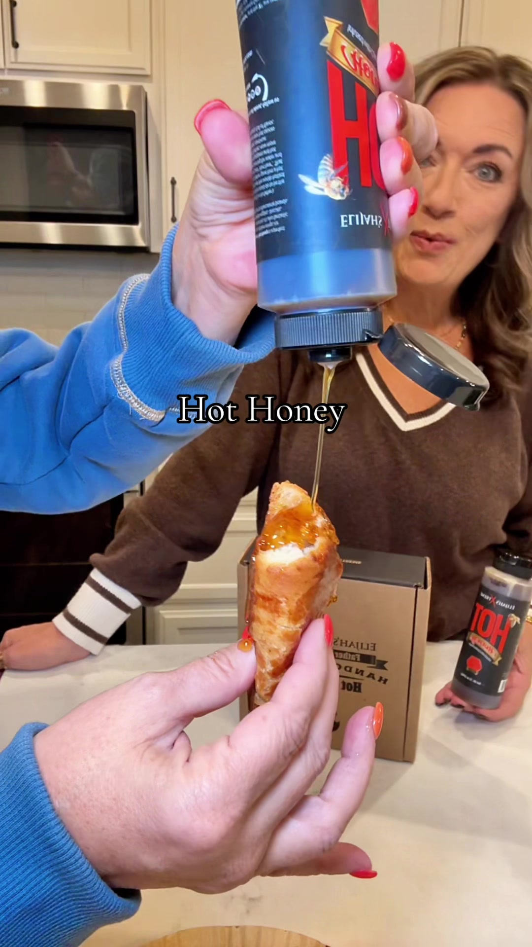 TikTok post by @spring.misty for Elijah's Xtreme. Caption reads: Taste so good! Just the right amount of heat. I....