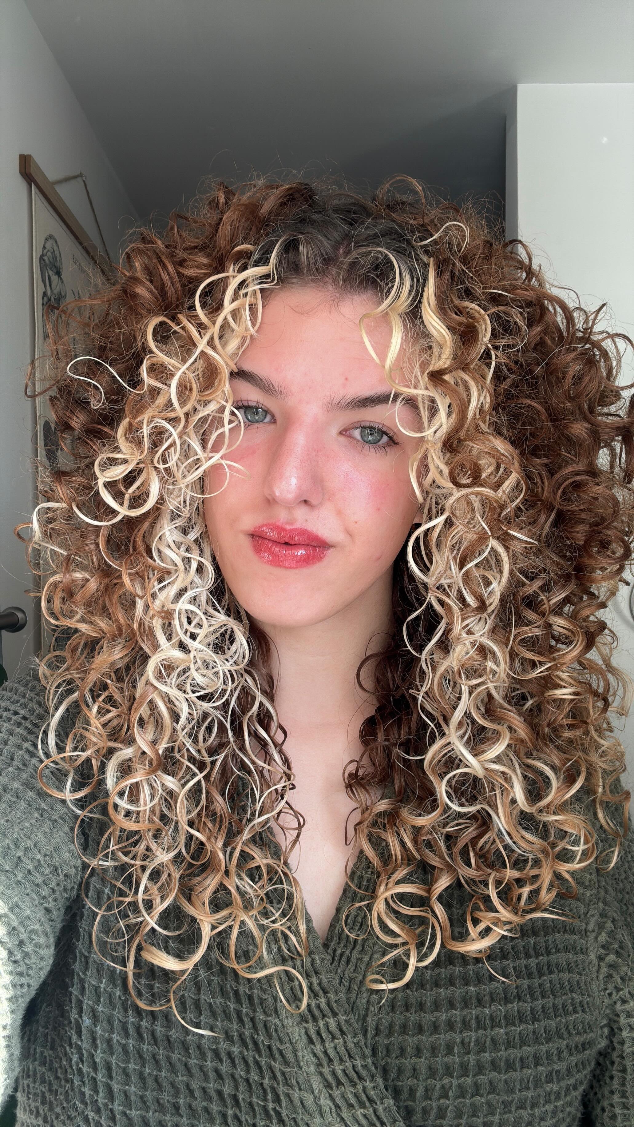 Instagram post by @curlieswithjulia for Politics and Prose. Caption reads: the heat is no joke 

even as we transition into....