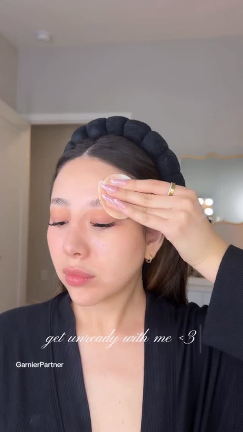 Instagram post by @eveealexandra for Garnier. Caption reads: Get unready with me with @garnierusa <3 🫧✨🤍🧖‍♀️....