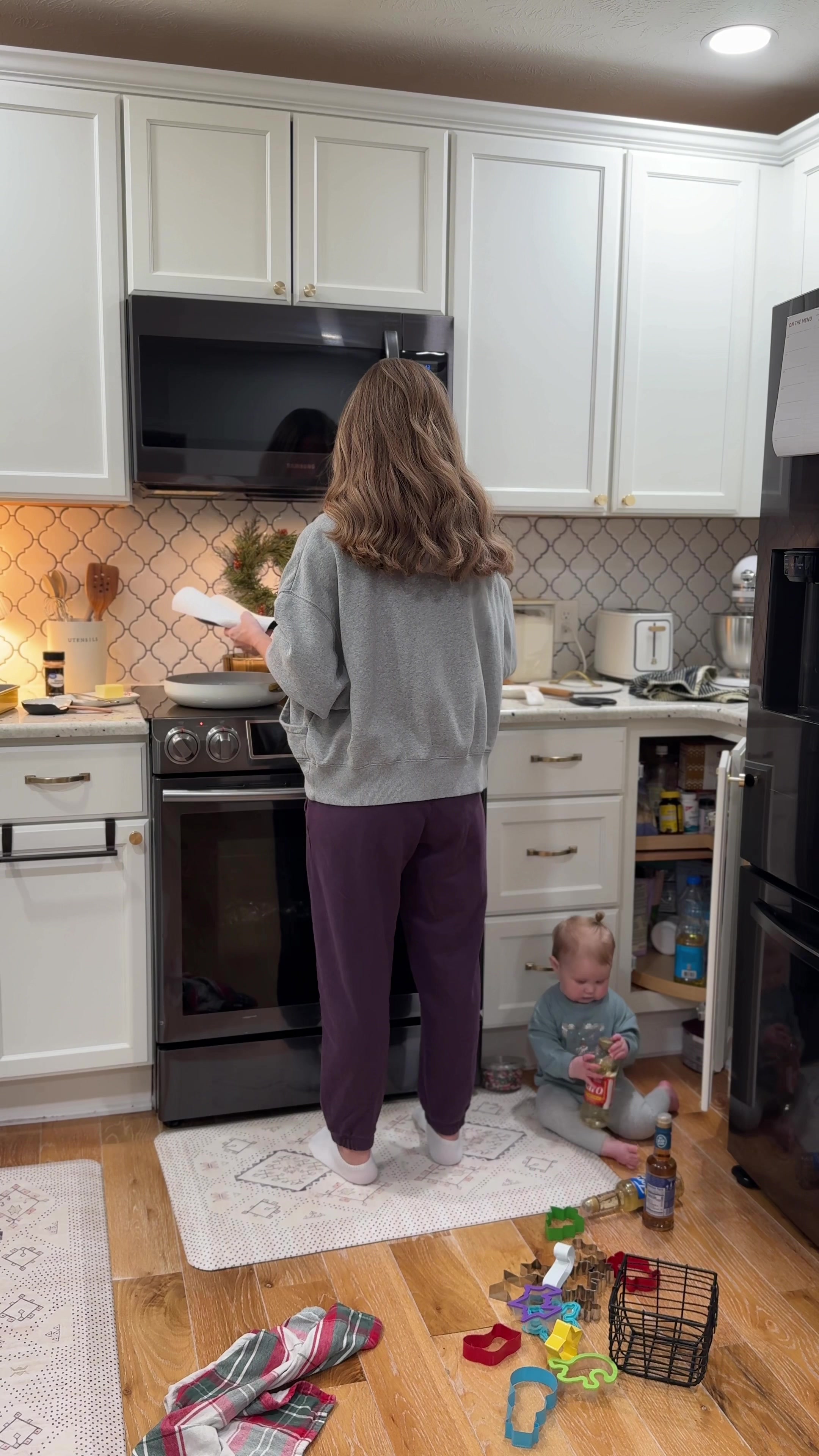 TikTok post by @mrs.mlwilliams for Little Spoon. Caption reads: [...] #realisticmom #cleanwithme #momof3 @Tubby....