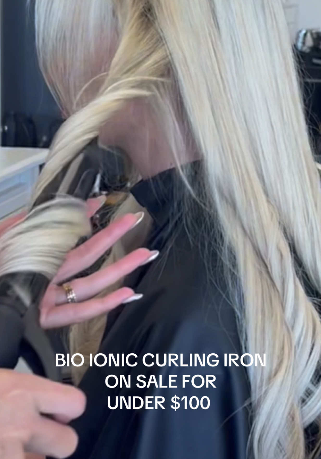 TikTok post by @hayley.mcclellan for Bio Ionic. Caption reads: @Bio Ionic curling iron under $100?! #hairtok....