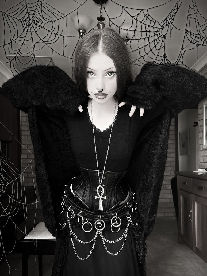 Instagram post by @zoe.the.strange for Orchard Corset. Caption reads: [...] luvr 🐾🧟 . . . . corset from :....