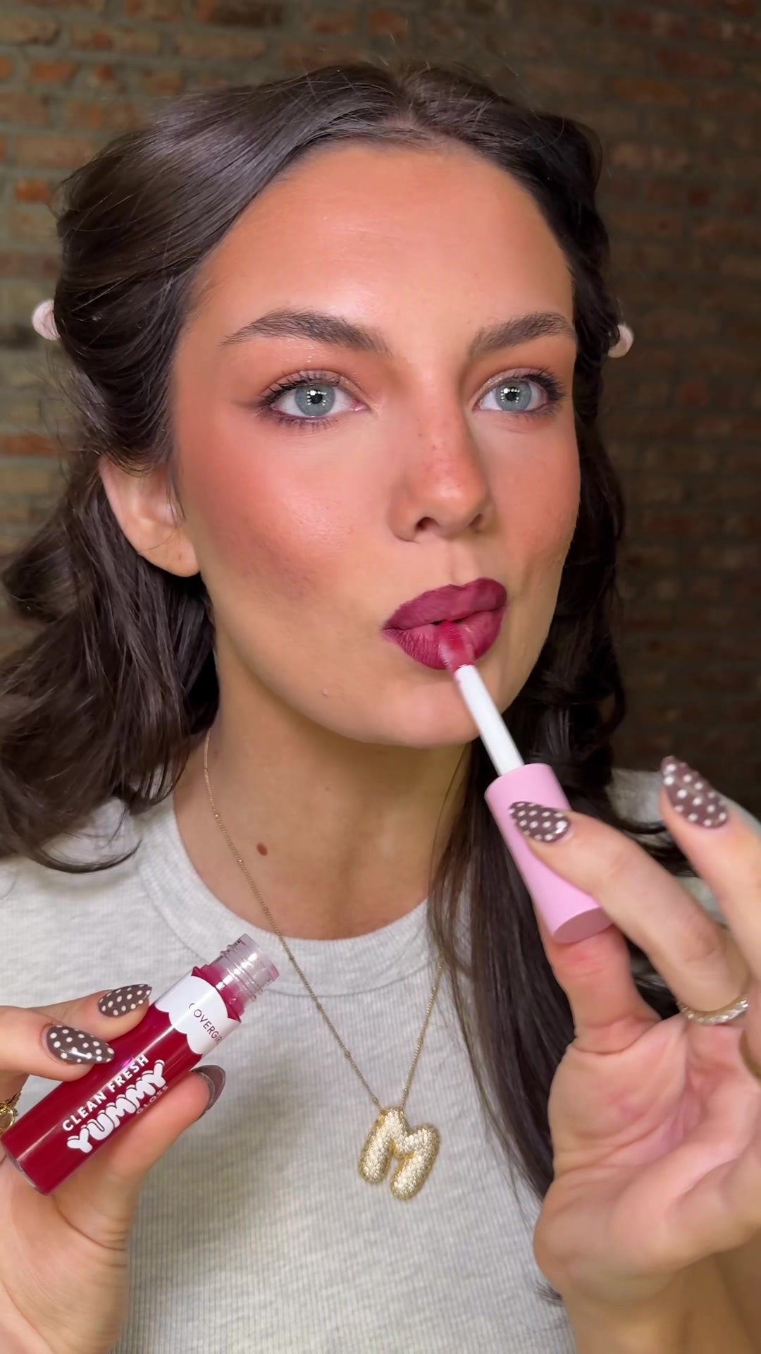 TikTok post by @margaret_kov for Family Dollar. Caption reads: the yummiest gloss for fall😋 #ad....