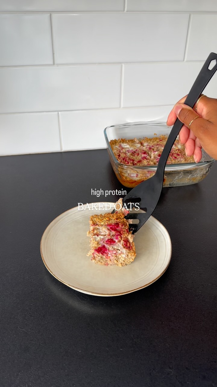 Instagram post by @_foodbyk for Protein World. Caption reads: HIGH PROTEIN BAKED OATS 😍

Super easy and so....