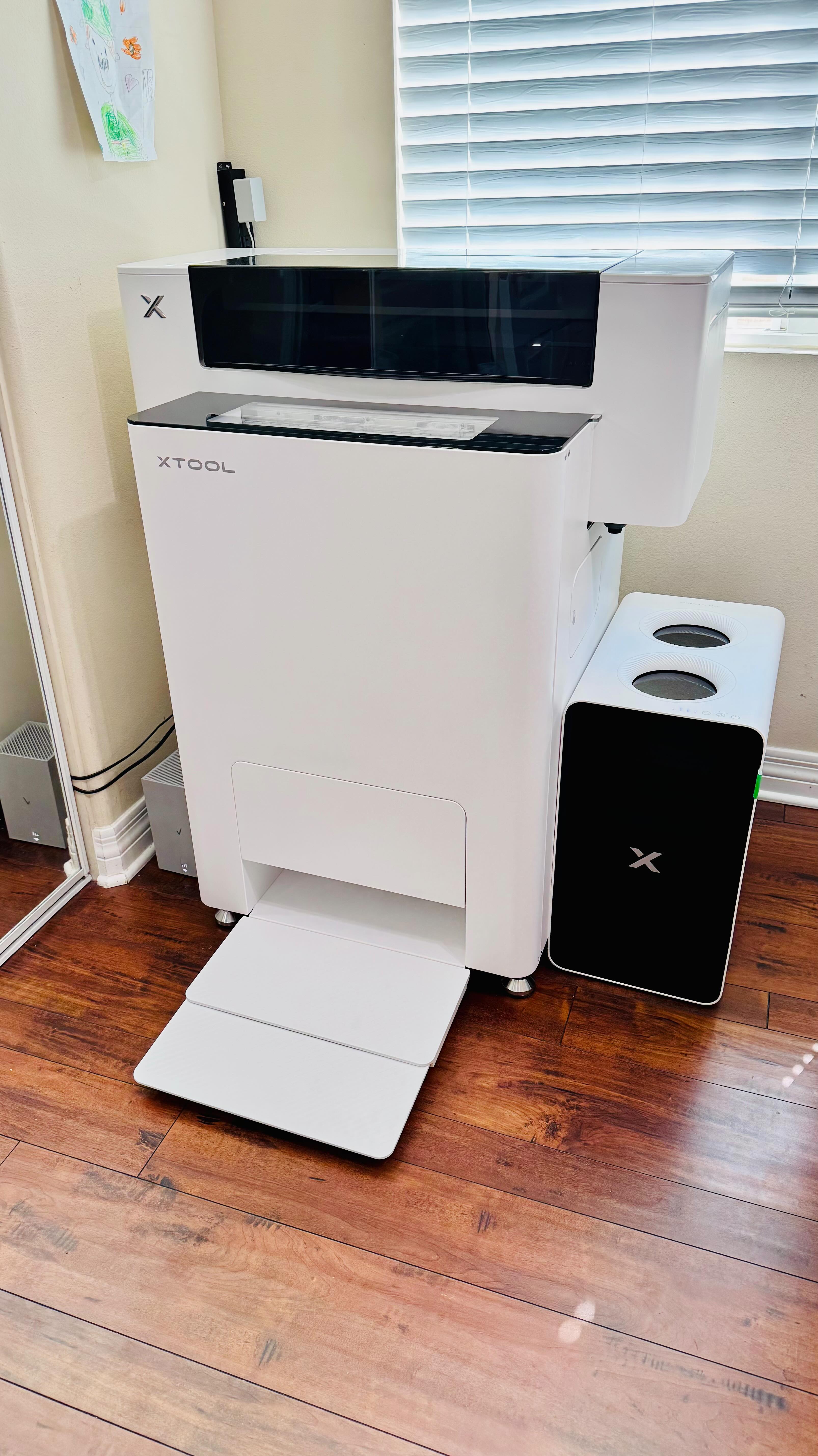 Instagram post by @lilyrosecraftroom for xTool. Caption reads: The wait is over! My xTool Apparel Printer setup....