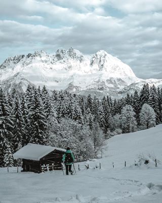 Instagram post by @michaelwpflr for Discover Earth. Caption reads: Early morning walks through a winter wonderland is....