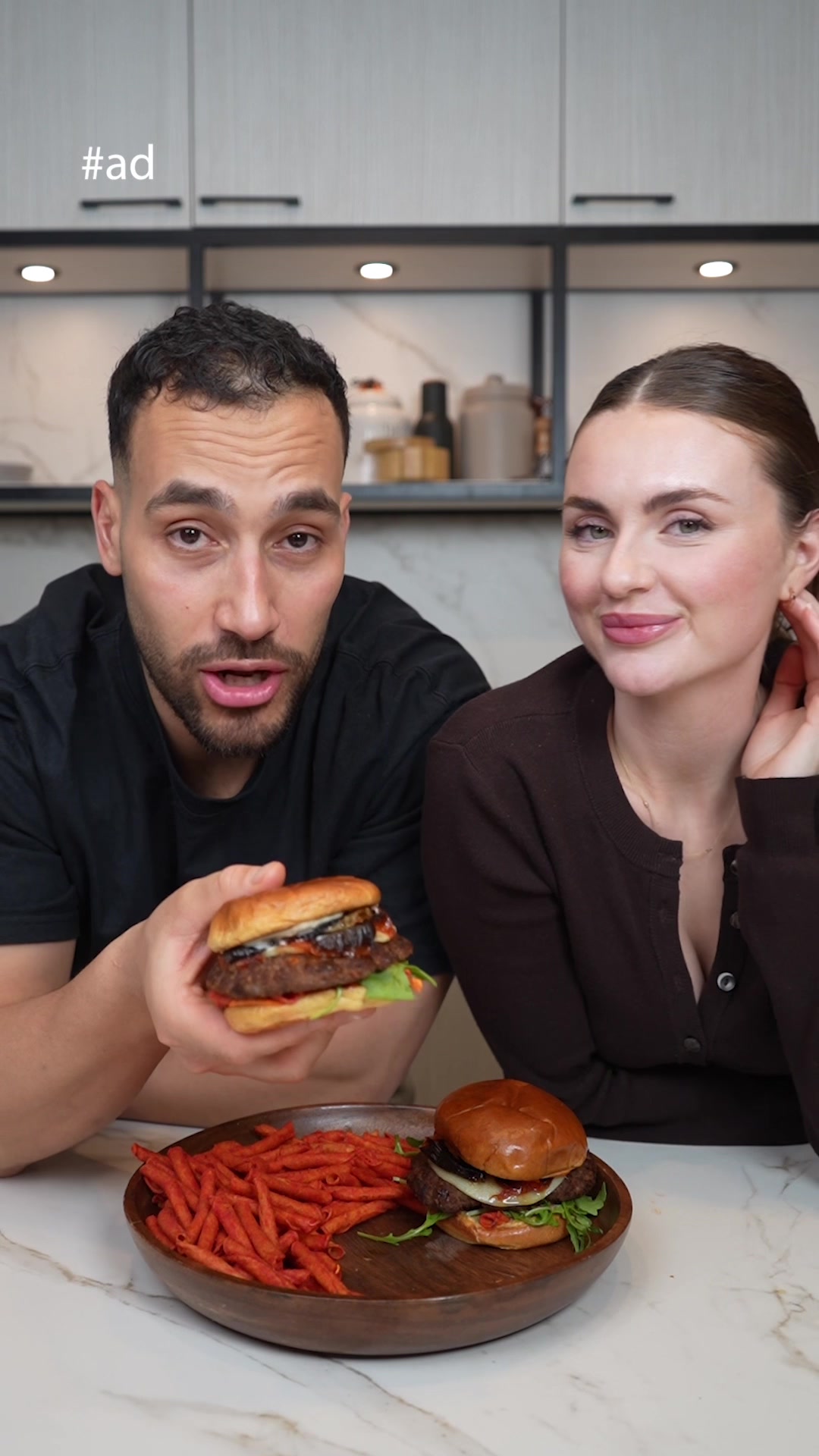 TikTok post by @hashandlyss for Takis. Caption reads: #AD We took burger night to a whole new level -....