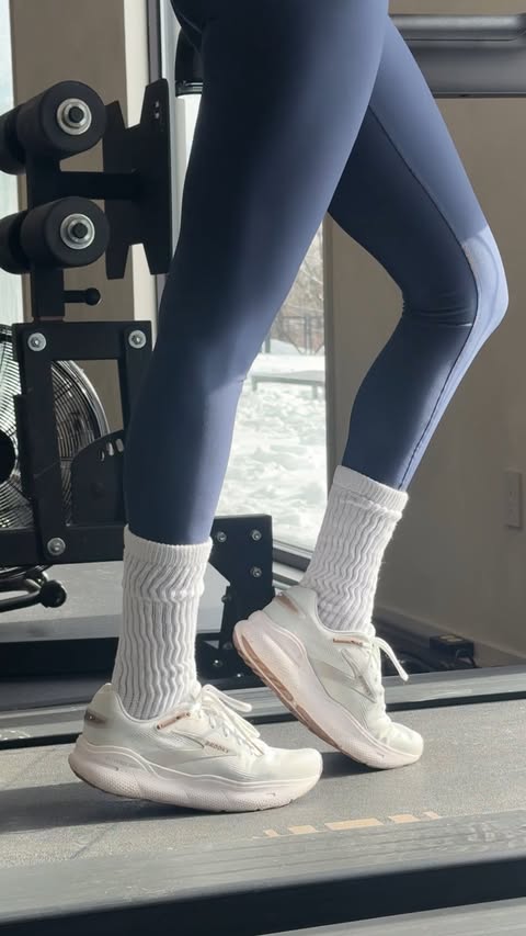 Instagram post by @tayshia for Famous Footwear. Caption reads: [...] in my Brooks Defyance Max from....