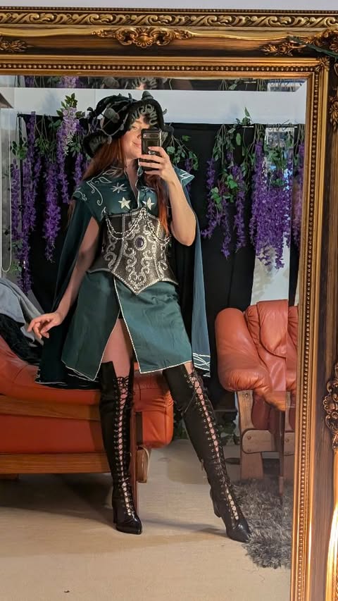 Instagram post by @thescarletthuntress for HolyClothing. Caption reads: Ready for the next spellcasting session ✨ Caplet....