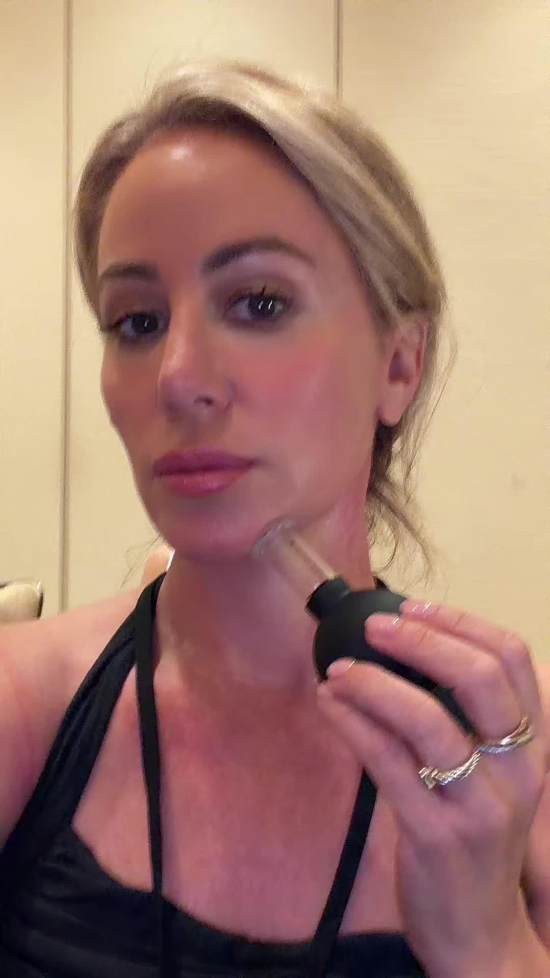 TikTok post by @officialkatjames for Nurse Jamie. Caption reads: [...] #cupping #snatchedjaw #over40 @Nurse Jamie.