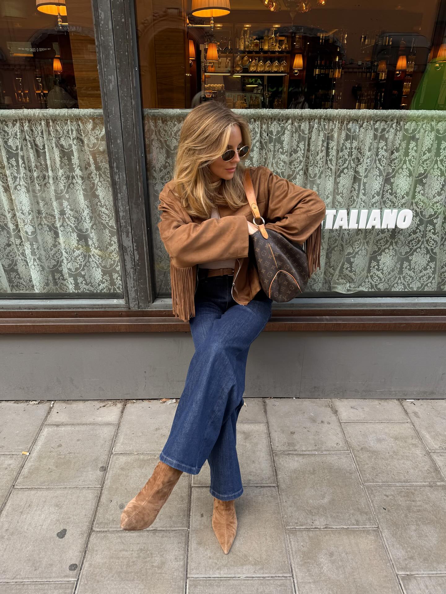 Instagram post by @lojsanwallin for Na-kd. Caption reads: camera roll moments 🤎 (advertisement wearing my....