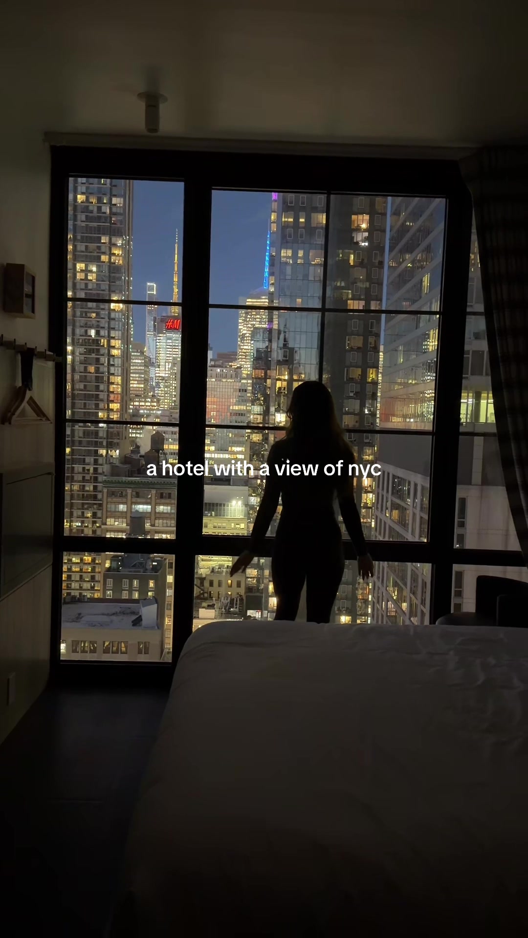 TikTok post by @mari.mcke for Moxy Hotels. Caption reads: @Moxy Hotels such a stunning view of nyc 🌃🖤 #nyc....