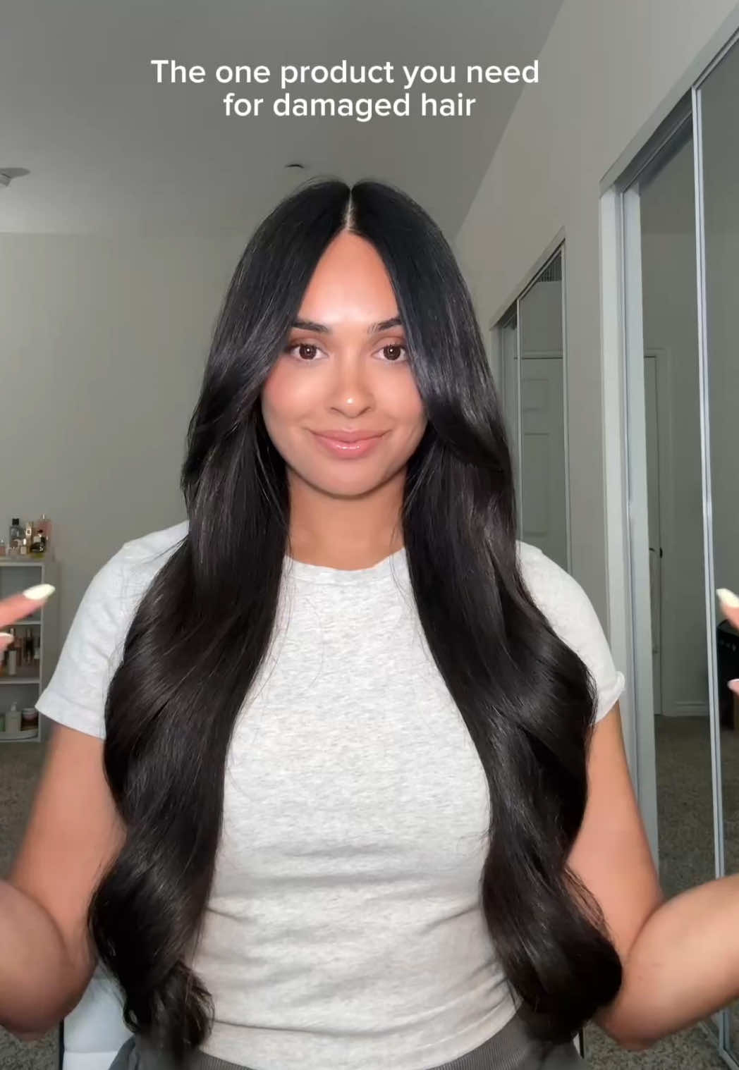 TikTok post by @cynthiadhimdis for K18 Hair. Caption reads: [...] one EASY step for healthier hair with @K18....