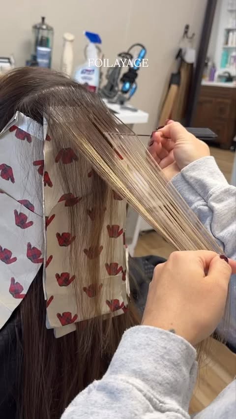 Instagram post by @hosfordhair for Moroccanoil Professionals. Caption reads: FOILAYAGE 🩵
•
@moroccanoil Blonde Voyage Powder....