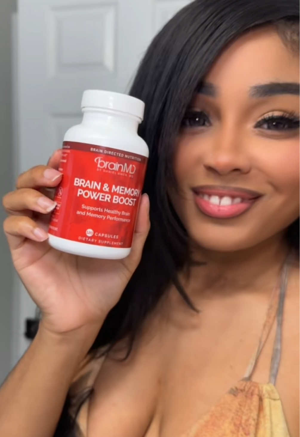 TikTok post by @thesashagomez for BrainMD. Caption reads: [...] MD today 💊 #BrainBoost #MemoryPower....