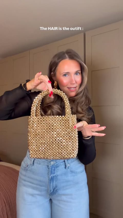 Instagram post by @sofynicoledobson for John Frieda. Caption reads: ad Trusty combo : jeans, comfy heels & BIG HAIR....