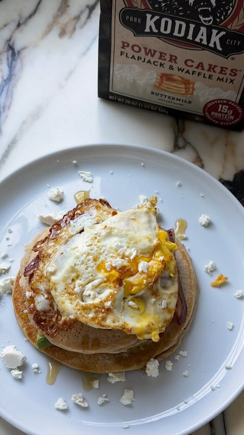 Instagram post by @clarapeirce for Kodiak Cakes. Caption reads: [...] 🥞 add even more protein to your....