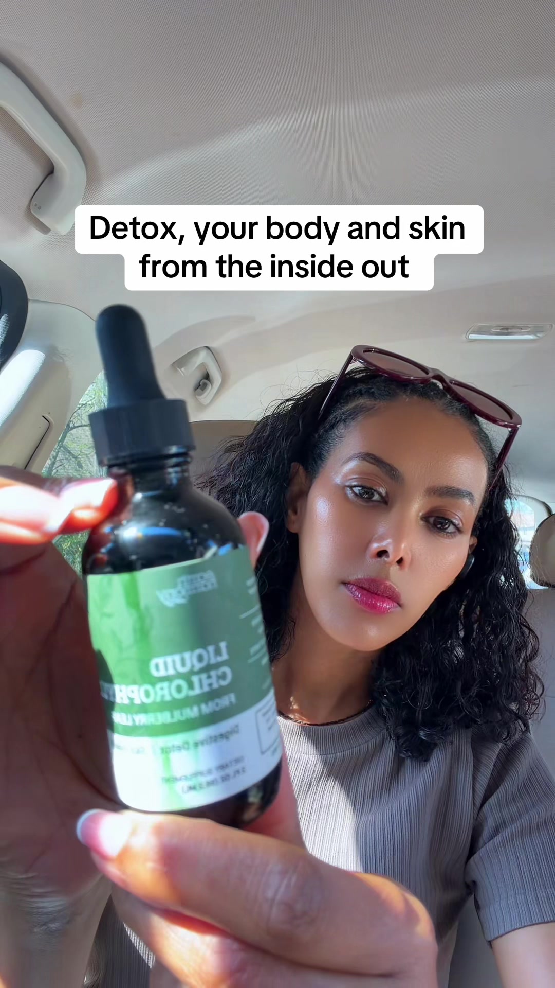 TikTok post by @_thisismeski for Earth Harmony. Caption reads: @Earth Harmony #chlorophylldrops #detoxyourbody....