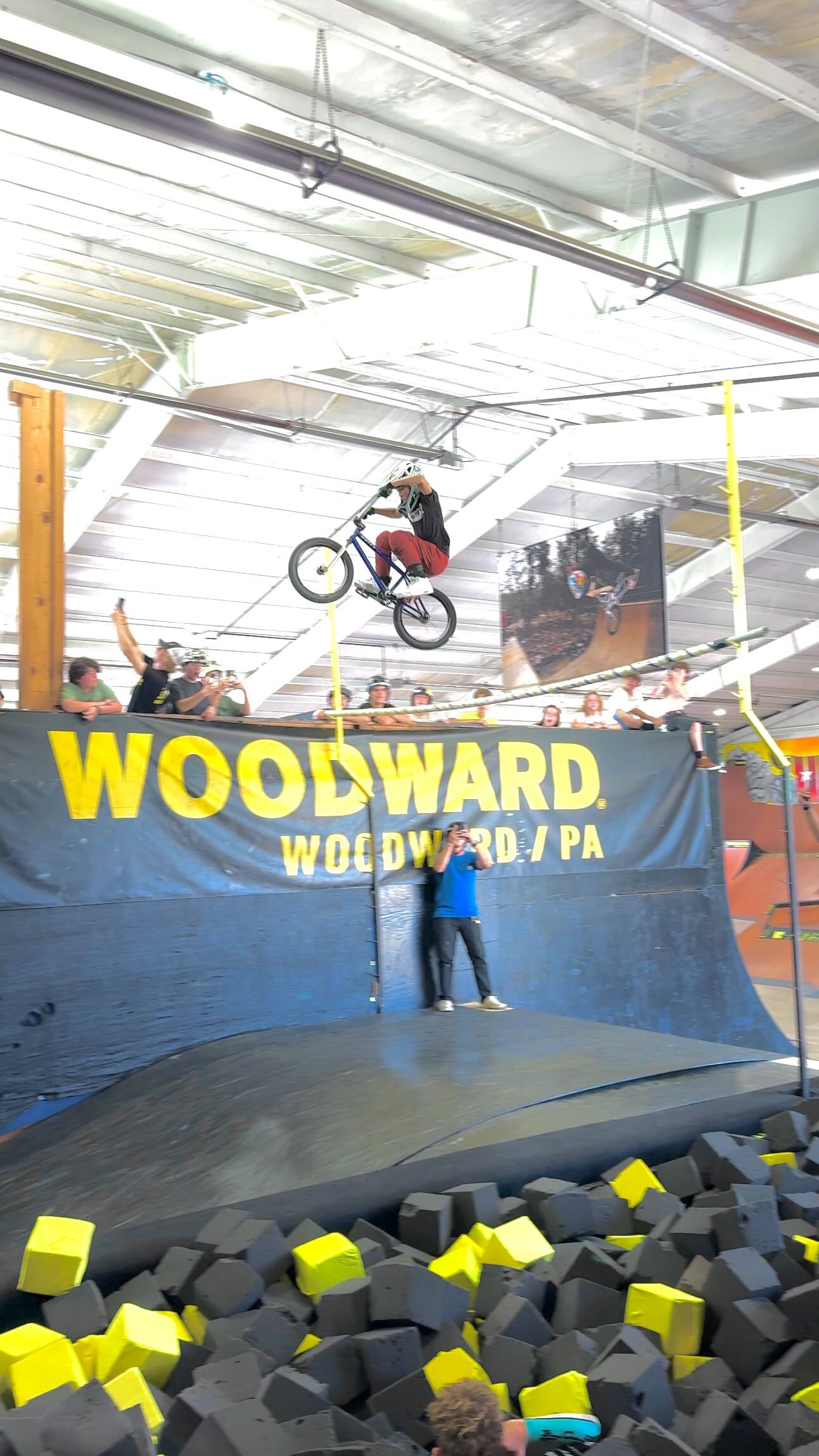 Instagram post by @huckkurinsky for Greenlight. Caption reads: Ending up clearing 8’ during the @woodwardbmx high....