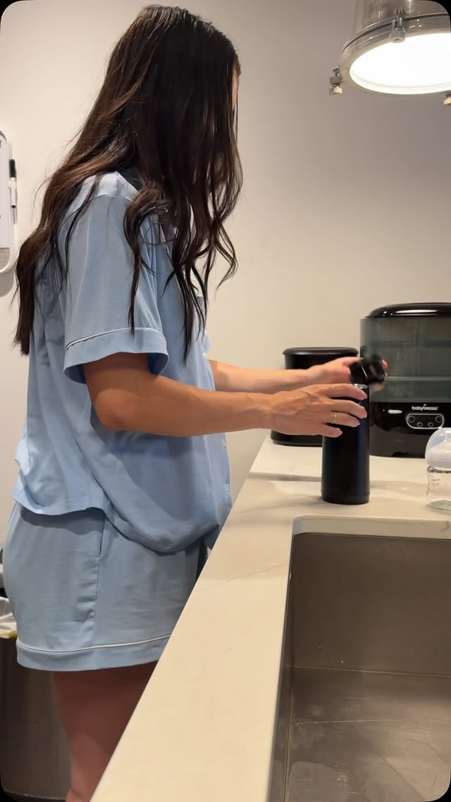 Instagram post by @michaela__kay for Baby Brezza. Caption reads: [...] out my portable milk warmer from @babybrezza....
