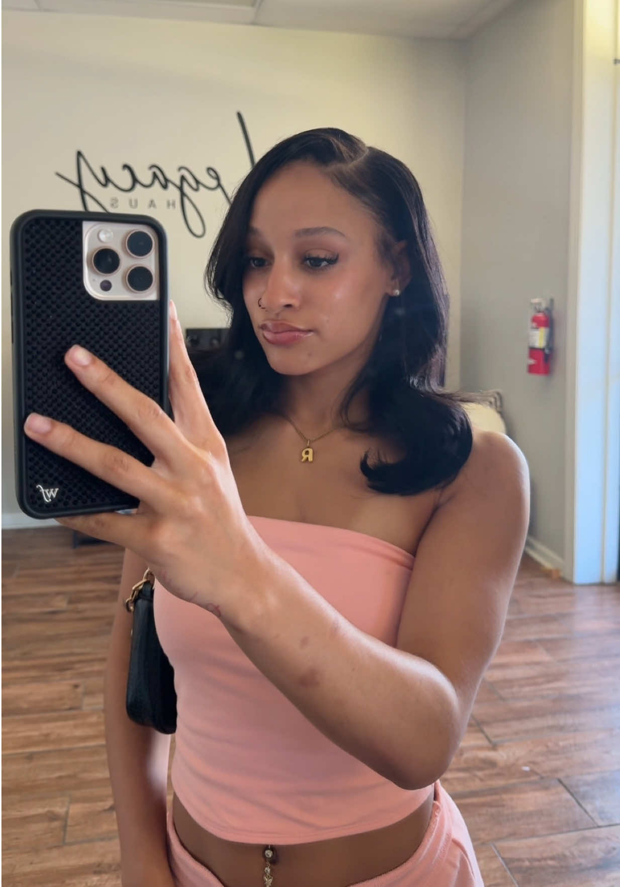 TikTok post by @ravenpernell_ for Wildflower Cases. Caption reads: i love @Wildflower Cases 🖤#tiktokshop #wildflower....