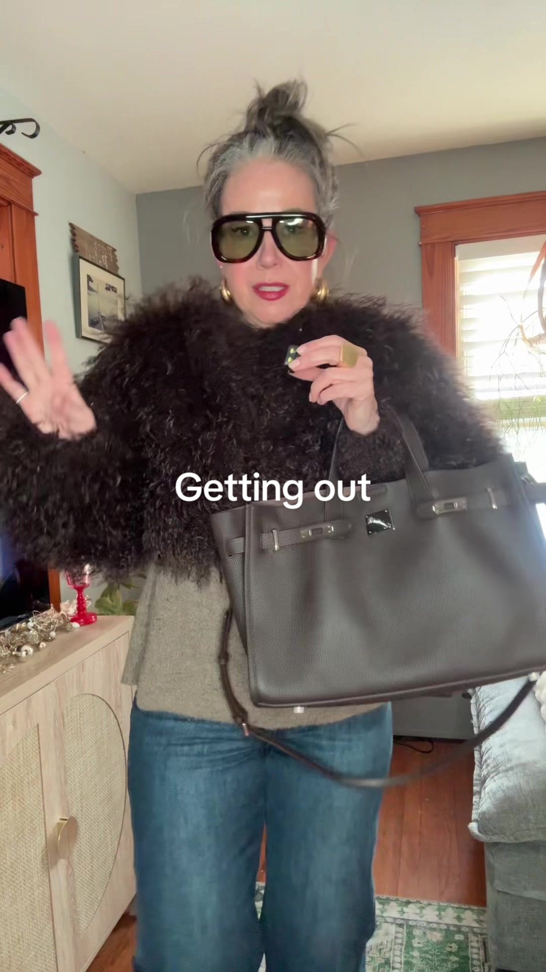 TikTok post by @aestheticaleestyled for DEZI. Caption reads: [...] my favorite cropped faux fur coat  @DEZI....