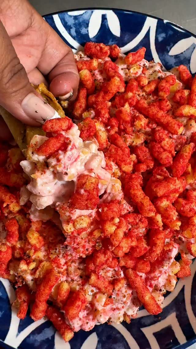 Instagram post by @liftingiscake for Trader Joe's. Caption reads: Hot Cheetos dip! I love me some Cheetos flamin....